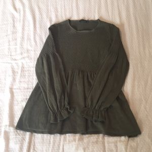 Olive-colored long-sleeve peplum top